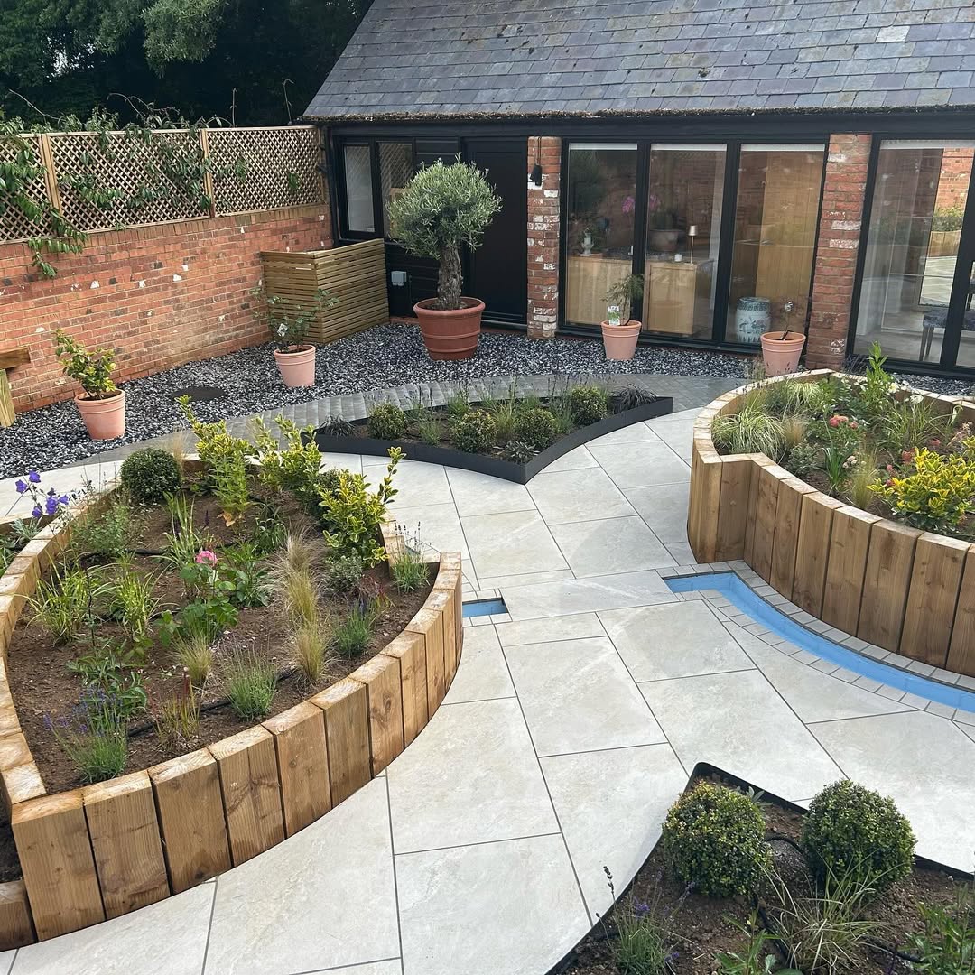 Wider view of the new courtyard with sleeper planters