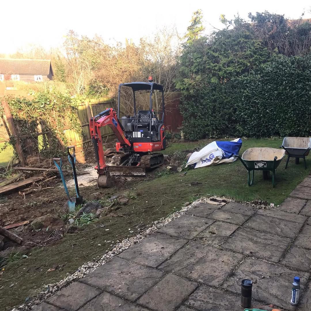 Mini digger on site during groundworks