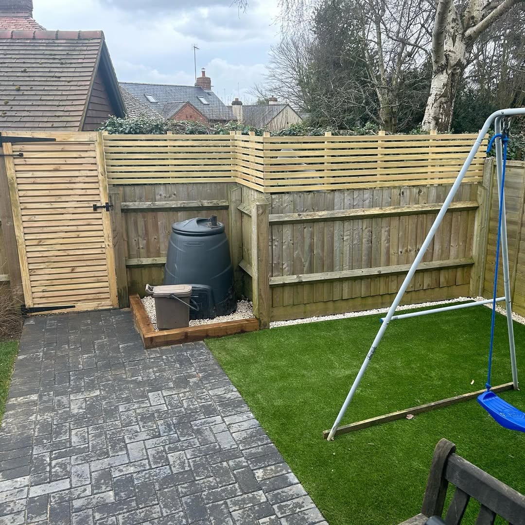 Tidy rear corner with new slatted screening, block paving and artificial play lawn